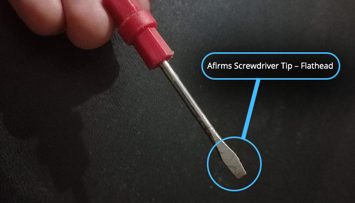 Side view of Afirms flathead screwdriver with metal tip and ergonomic handle